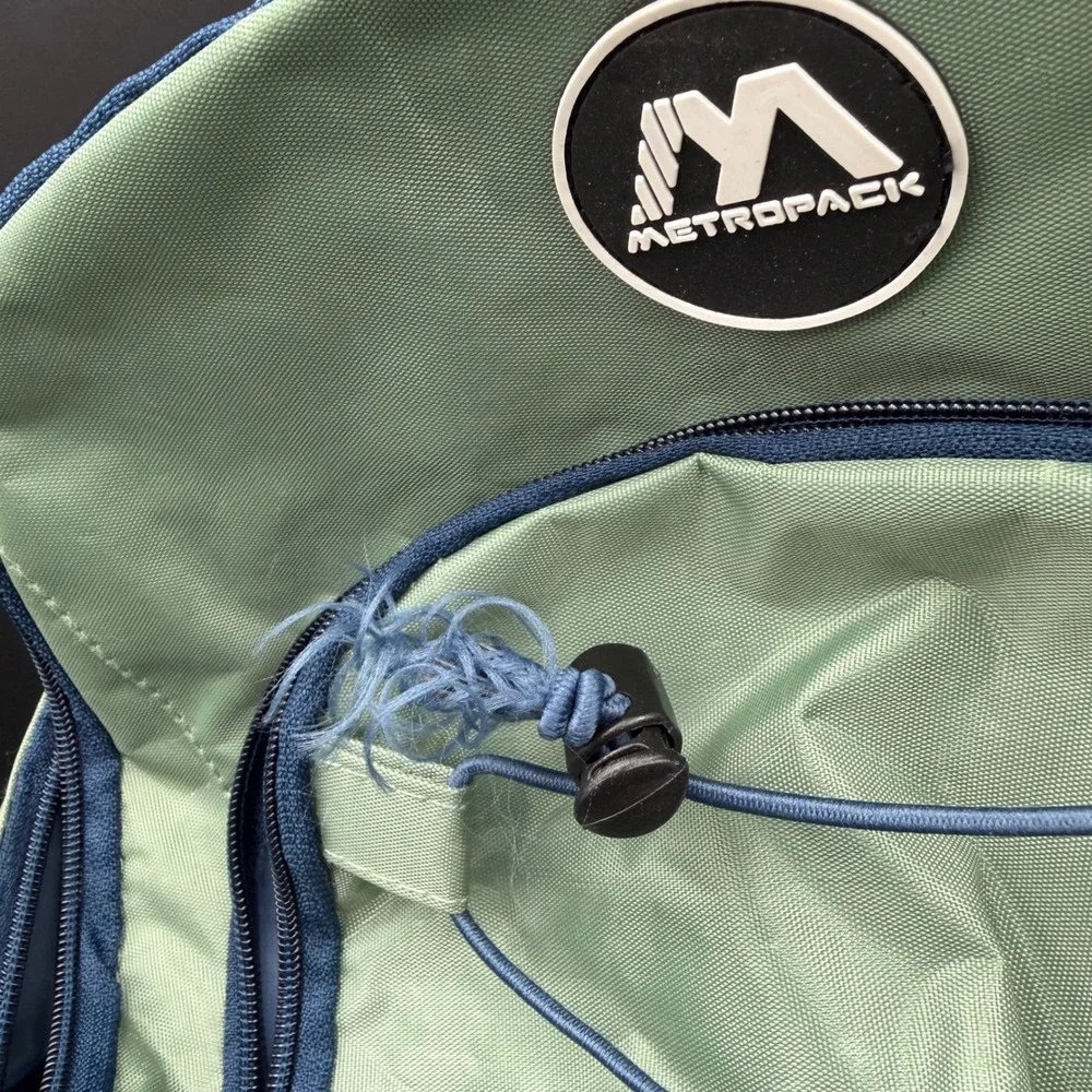 Metropack Backpack Sage Green Navy Blue School Travel Bag Bungee Front New Tag